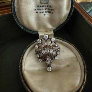 Victorian diamond comet brooch, the diamond spray with old cut diamonds in silver and gold setting with pendant fitting and detachable brooch fitting, estimated total diamond weight approximately 2cts. Length 29mm.